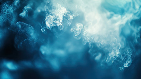 Captivating blue smoke swirls create an ethereal atmosphere, blending movement and light against a dark background, perfect for artistic projects or digital designs.の素材
