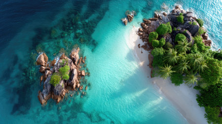 This stunning aerial view showcases a tropical island surrounded by vibrant turquoise waters. The lush greenery and rocky formations create a tranquil escape, perfect for relaxation and adventure.の素材