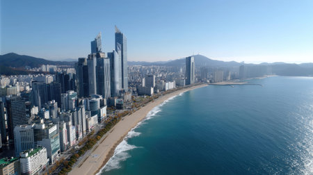 This stunning aerial perspective captures a vibrant urban cityscape beside a tranquil beach, showcasing modern skyscrapers against a serene ocean backdrop.の素材