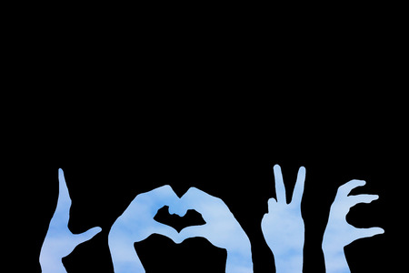 The hand symbol for the word love represented by Love the bright and wholesome.の写真素材