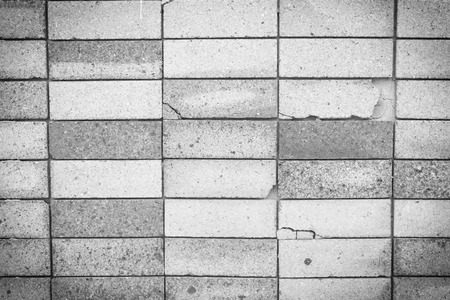 Black background brick wall show damage.の写真素材