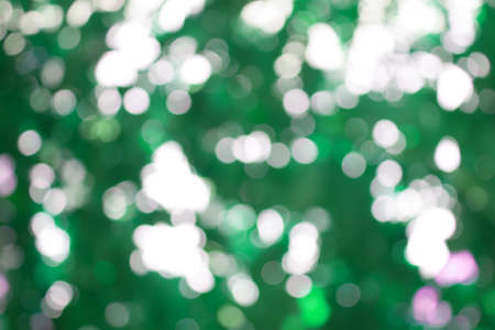Abstract blur with bokhe of light through the treesの写真素材