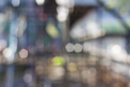 Abstract blur with bokhe of light through the treesの写真素材