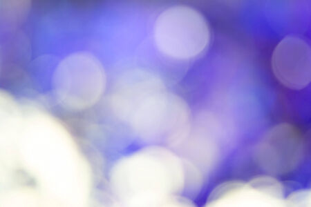 Abstract blur with bokhe of light through the treesの写真素材