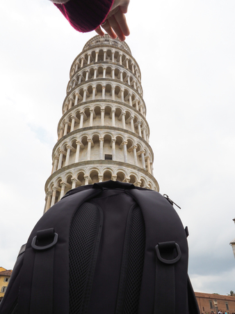 Tourists like to go to the Tower of Pisa, Italy.の写真素材