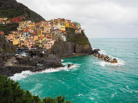 Manarola beautiful seaside town of Italy on a stormy day.の写真素材