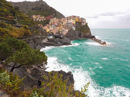 Manarola beautiful seaside town of Italy on a stormy day.の写真素材