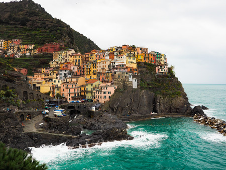 Manarola beautiful seaside town of Italy on a stormy day.の写真素材