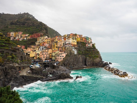 Manarola beautiful seaside town of Italy on a stormy day.の写真素材