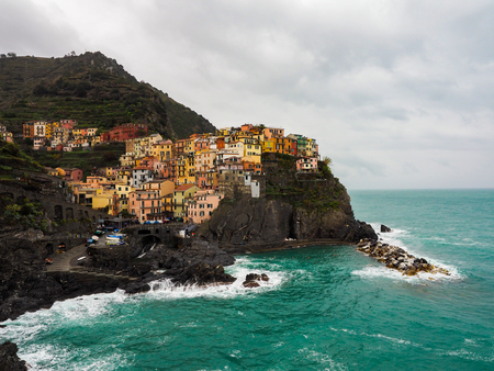 Manarola beautiful seaside town of Italy on a stormy day.の写真素材