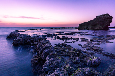 bright sunset over rocky sea pools. Mediterranean Sea, Israelの写真素材