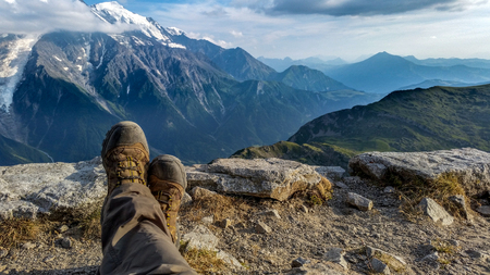 legs with alps backgroundの写真素材