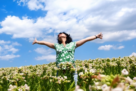 Happiness young woman in the nature           の写真素材