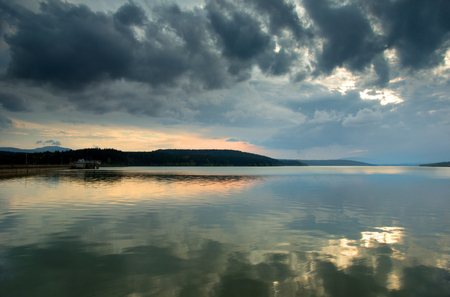 Dramatic clouds over Koprinka dam situated in south Bulgariaの写真素材