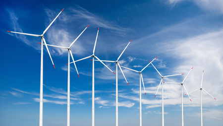 3d render of wind turbines on sky backgroundの写真素材