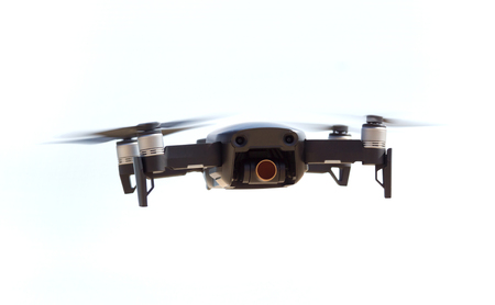 Flying drone on white backgroundの写真素材