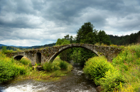 Old Roman bridge in the Rodopi mountain located in Bulgariaの写真素材