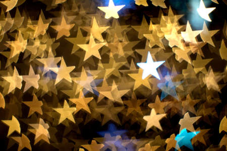 Star bokeh lights on black background