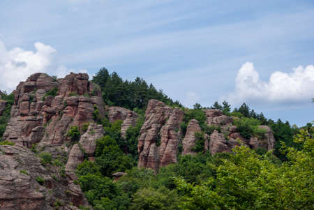 The Belogradchik Rocks are a group of strangely shaped sandstone and conglomerate rock formations located in northwest Bulgaria.の写真素材