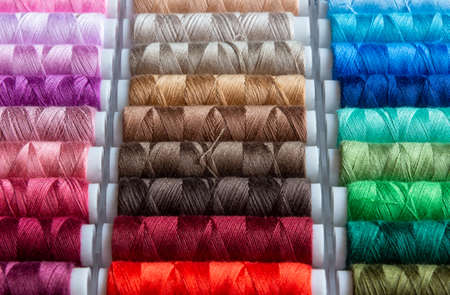 Sewing thread rolls in different colorsの写真素材