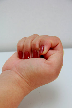salvador, bahia / brazil - november 10, 2013: woman hand with closed fingers. *** Local Caption ***のeditorial素材