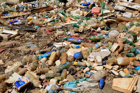 salvador, bahia, brazil - january 6, 2021: garbage and pet bottles are seen accumulated in a canal on the Rio Camurugipe, in the Pituba neighborhood, in the city of Salvador.のeditorial素材
