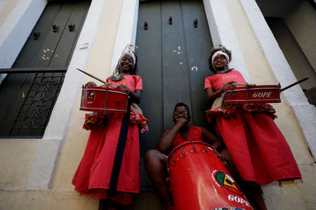 salvador, bahia / brazil - february 19, 2019: children from Banda Dida are seen next to musical...