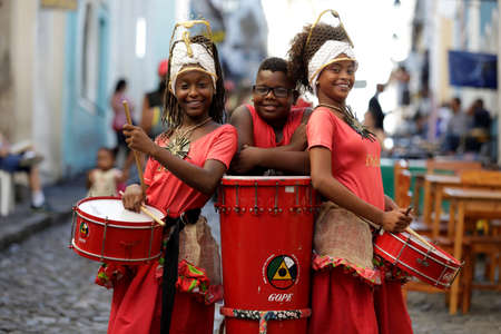 salvador, bahia / brazil - february 19, 2019: children from Banda Dida are seen next to musical...