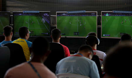 salvador, bahia / brazil - october 25, 2019: young people are seen playing video game football...