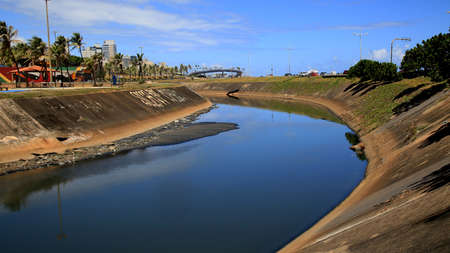 salvador, bahia, brazil - january 6, 2021: view of the Rio Camurugipe canal in the city of Salvador. The river receives sewage water and is thrown at Pituba Beach.のeditorial素材