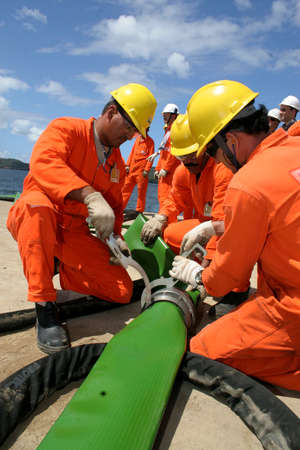 madre de deus, bahia, brazil - august 16, 2006: fire-fighting brigades are seen during training with...