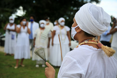 salvador, bahia, brazil - january 21, 2021: members of the Candomble terreiro participate in an act on the National Day to Combat Religious Intolerance, in the Metropolitan Park of Abaete in the city of Salvador.のeditorial素材