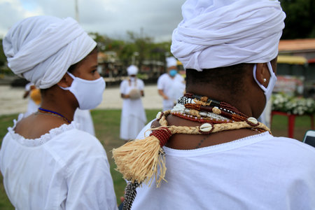 salvador, bahia, brazil - january 21, 2021: members of the Candomble terreiro participate in an act on the National Day to Combat Religious Intolerance, in the Metropolitan Park of Abaete in the city of Salvador.のeditorial素材