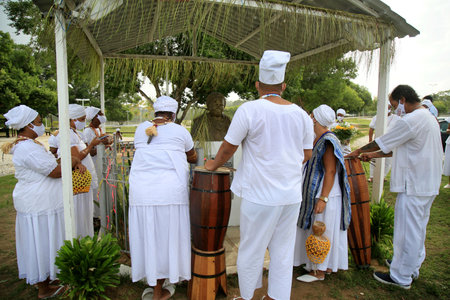 salvador, bahia, brazil - january 21, 2021: members of the Candomble terreiro participate in an act on the National Day to Combat Religious Intolerance, in the Metropolitan Park of Abaete in the city of Salvador.のeditorial素材