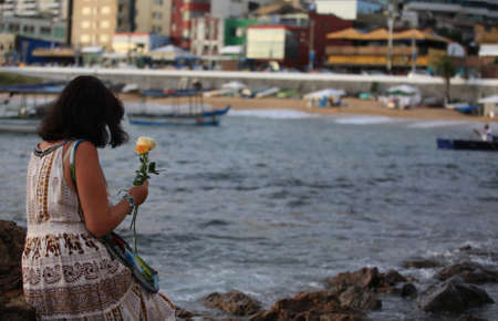 salvador, bahia / brazil - february 1, 2018: Movement of Orixa Iemanja devotees and supporters in the Rio Vermelho neighborhood of Salvador, during preparations for the feast that will take place on February 2. *** Local Caption ***.のeditorial素材
