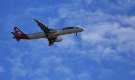salvador, bahia / brazil - july 21, 2016: Airbus A321-231 from the airline Tam is seen flying in the...