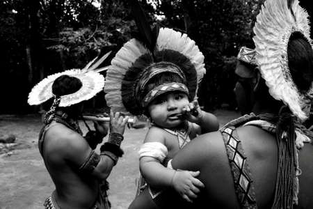 porto Seguro, bahia / brazil - april 13, 2006: Pataxo Indians are seen in the Jaqueira village in the city of Porto Seguro, in southern Bahia.のeditorial素材