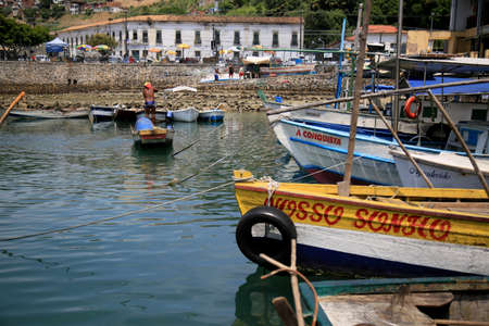 salvador, bahia, brazil - january 19, 2021: fishing boats are seen in the port near the fair of sao...