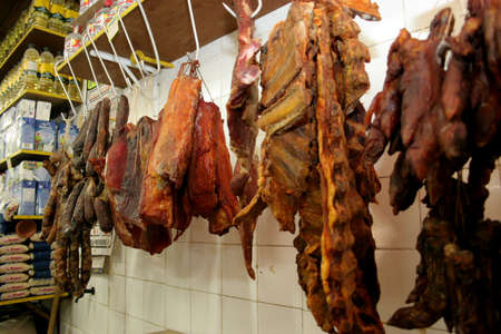 salvador, bahia / brazil - august 17, 2006: Butcher shop is seen selling dried and smoked meats in the city of Salvador.のeditorial素材