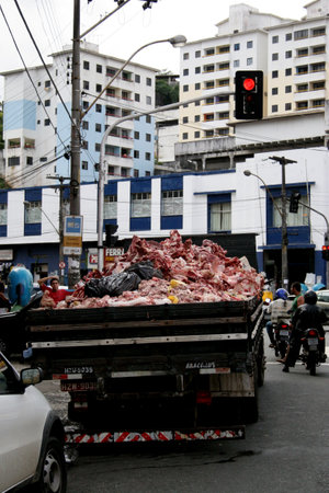 salvador, bahia / brazil - august 14, 2006: truck collects bone bolvina in a butcher shop in the neighborhood of Sete Portas in the city of Salvador.のeditorial素材