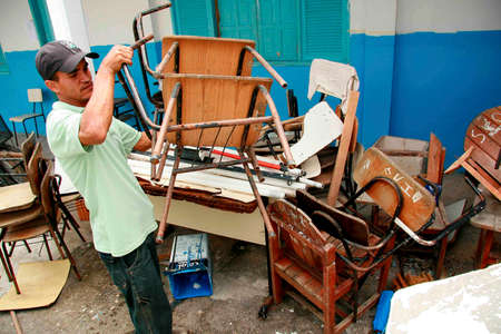 porto Seguro, bahia / brazil - september 3, 2010: Broken classroom moliliary is seen at Pero Vaz de Caminha school in the Paraguay neighborhood of Porto Seguro.のeditorial素材