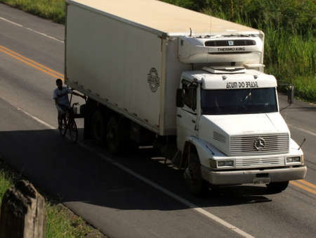 eunapolis, bahia / brazil - april 5, 2011: vehicles are seen transiting the highway BR 101, in the...
