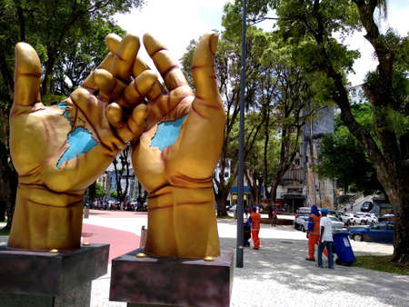 salvador, bahia / brazil - november 16, 2020: sculpture of crossed hands is seen in a square in the...