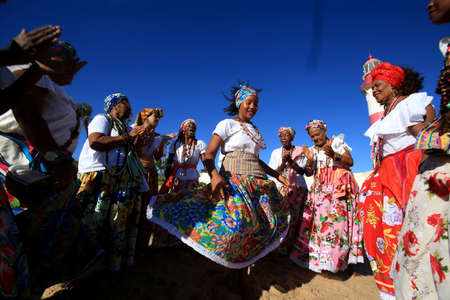 salvador, bahia / brazil - march 2, 2017: members of the cultural group As Ganhadeiras de Itapua seen at the Itapua Lighthouse in Salvador city.のeditorial素材