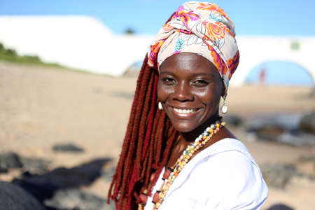 salvador, bahia / brazil - march 2, 2017: members of the cultural group As Ganhadeiras de Itapua seen at the Itapua Lighthouse in Salvador city.のeditorial素材