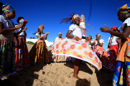 salvador, bahia / brazil - march 2, 2017: members of the cultural group As Ganhadeiras de Itapua seen at the Itapua Lighthouse in Salvador city.のeditorial素材