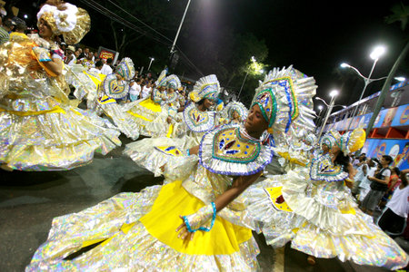 salvador, bahia / brazil - february 14, 2015: Members of the Afro Male DeBale block are seen in the Campo Grande neighborhood during Carnival celebrations in the city of Salvador.のeditorial素材