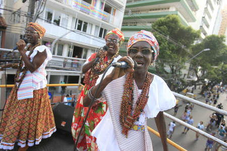 salvador, bahia / brazil - february 24, 2017: Members of the Itapua Ganhadeiras Cultural Group are seen during presentation at the Carnival in the city of Salvador.のeditorial素材