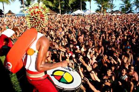 porto Seguro, bahia / brazil - february 24, 2009: Tourists are seen dancing in choreography with Ax songs at a beach shack in Porto Seguro.のeditorial素材