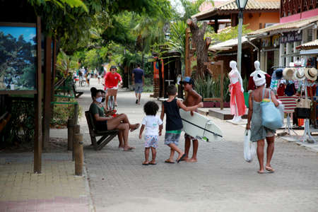 mata de sao joao, bahia / brazil - october 20, 2020: people are seen at Praia do Forte, on the coast of the city of Mata de Sao Joao.のeditorial素材